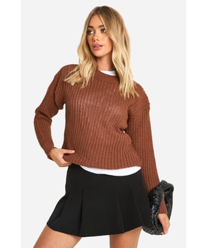 Chunky ribbed knit texture for added warmth and style
        Classic crew neck design for versatile layering
        Relaxed fit through the body for comfortable wear
        Dropped shoulder seams for a casual, laid-back look
        Ribbed cuffs and hem for a snug fit
    
    Embrace the cosy charm of our Fisherman Crew Neck Jumper, a must-have addition to your casual wardrobe. This versatile piece effortlessly combines comfort with style, making it perfect for those laid-back days or casual outings. Layer it over a crisp white tee and pair with your favourite denim for a classic look, or dress it up with a pleated skirt and ankle boots for a chic autumn ensemble. The jumper's relaxed silhouette and chunky knit texture make it ideal for family gatherings, weekend brunches, or casual coffee dates. Its timeless design ensures it will remain a staple in your wardrobe for seasons to come, offering endless styling possibilities for the fashion-forward woman who values both trend and comfort.