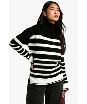 Bold striped pattern for a striking visual impact
        Cosy roll neck design for extra warmth
        Long sleeves with ribbed cuffs for a snug fit
        Relaxed silhouette for comfortable everyday wear
        Versatile design suitable for various casual occasions
    
    Make a statement with this eye-catching Stripe Roll Neck Jumper from Boohoo. The bold contrast between the stripes creates a captivating look that's sure to turn heads. Perfect for the fashion-forward woman who loves to stay on-trend, this jumper offers both style and comfort. The roll neck provides extra warmth on chilly days, while the relaxed fit ensures ease of movement. Style it with wide-leg trousers and chunky boots for a contemporary casual look, or pair it with a midi skirt and trainers for a chic weekend ensemble. Ideal for family gatherings, coffee dates with friends, or casual outings, this jumper is a versatile addition to your wardrobe that can be dressed up or down with ease. Its timeless design ensures it will remain a favourite for seasons to come.