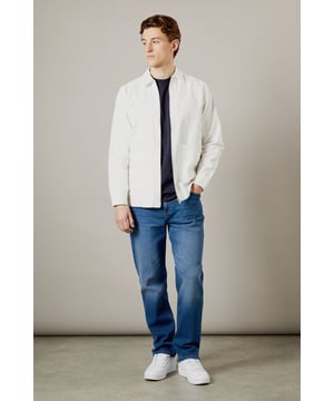 Versatile canvas jacket with a clean, minimalist design
        Full-length front zip closure for easy wear
        Classic collar adds a touch of sophistication
        Long sleeves with buttoned cuffs for a polished look
        Relaxed fit allows for comfortable layering
    
    The Logan Canvas Jacket from Burton is a wardrobe essential that combines practicality with style. Perfect for the man who appreciates classic design, this jacket is ideal for various casual occasions. Whether you're heading to the pub with mates or attending a family gathering, it's a versatile choice. Layer it over a simple t-shirt and pair with your favourite jeans for an effortlessly cool look. The relaxed fit ensures comfort throughout the day, while the full-length zip allows for easy temperature regulation. For a smart-casual ensemble, wear it over a crisp button-down shirt with chinos and trainers. The neutral hue makes it easy to incorporate into your existing wardrobe, offering endless styling possibilities for the modern British gent who values both comfort and style in his everyday attire.
