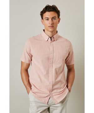 Textured woven fabric with subtle surface interest for added dimension
        Classic button-down collar for a smart-casual finish
        Convenient chest pocket detail for practical styling
        Short sleeves with neat hems perfect for warmer days
        Centre back pleat providing enhanced comfort and movement
    
    This Maine textured short sleeve shirt combines relaxed comfort with understated style. The button-down collar offers a refined touch whilst maintaining a laid-back feel, making it ideal for casual settings. Style as shown with light-coloured chino shorts and white trainers for effortless summer outings, or pair with tailored trousers for garden parties and family gatherings. The textured fabric adds subtle character to your ensemble without overwhelming it. For cooler evenings, layer under a lightweight bomber jacket or cardigan. This versatile shirt transitions seamlessly from daytime casual to evening drinks, making it an essential addition to your warm-weather wardrobe. The relaxed fit ensures all-day comfort whilst maintaining a put-together appearance that works across multiple settings.