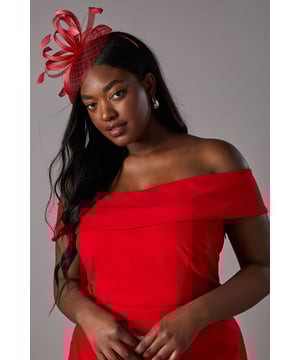 Offering a bold take on race-day style or adding a flair to wedding guest dressing, fascinators are our favourite accessory. Beautifully complementing our formal outfitting, this hat is an instant sartorial statement. Crafted from textured  mesh fabric, this fascinator takes on bold hues perfectly and holds it's shape to sit perfectly across your forehead Fixes with a headband and delivered in a box.