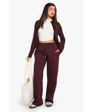 Straight-leg design for a modern silhouette
        Comfortable elasticated waistband with drawstring
        Practical side pockets for essentials
        Versatile style suitable for various casual occasions
        Soft fabric blend for all-day comfort
    
    Embrace laid-back chic with these straight-leg joggers from Boohoo. Perfect for the fashion-forward woman who values both style and comfort, these trousers offer a contemporary twist on classic loungewear. The straight-leg cut provides a sleek, elongating effect, while the elasticated waistband ensures a snug, adjustable fit. Style them with a cropped cardigan and a simple white tee for an effortlessly cool ensemble. These joggers transition seamlessly from lazy Sunday mornings to casual catch-ups with friends. Pair them with trainers and a oversized tote for running errands, or dress them up with a fitted blazer and ankle boots for a trendy smart-casual look. The versatility of these joggers makes them a must-have addition to any wardrobe, offering endless styling possibilities for the modern, on-the-go woman.