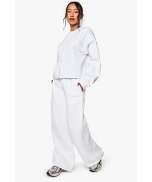 Elegant 'Bride' embroidery detail adds a special touch for your wedding celebrations
        Straight leg design offers a relaxed yet flattering silhouette
        Practical side pockets for convenience on your special day
        Comfortable elasticated waistband ensures all-day comfort
        Soft fabric blend provides the perfect balance of comfort and style
    
    Make your bridal preparations as special as the big day itself with these charming straight leg joggers. The delicate 'Bride' embroidery marks the occasion whilst maintaining ultimate comfort as you get ready for your walk down the aisle. Style with the matching hoodie for a coordinated bridal loungewear look, perfect for those pre-ceremony photographs with your bridesmaids. The relaxed straight leg cut offers ease of movement whilst still looking put-together for breakfast with family or having your hair and makeup done. These joggers transition beautifully from morning preparations to evening wind-down, ensuring you feel comfortable yet special throughout your wedding day journey. Pair with white trainers for a contemporary bridal look or slip on some elegant slippers for pure comfort during those precious getting-ready moments.