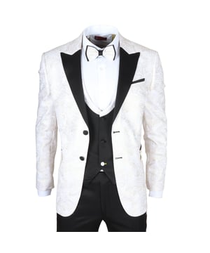 Haz una declaración audaz y elegante con este traje de esmoquin de 3 piezas, que cuenta con un blazer blanco a medida con lujosos detalles en oro paisley. Combinado con un chaleco negro con ribete dorado a juego y pantalones negros a medida, este conjunto es perfecto para bodas, fiestas formales y eventos especiales. El corte moderno realza tu silueta, mientras que la pajarita a juego incluida une todo el look con una coordinación refinada. Confeccionado con una mezcla de poliéster y licra de alta calidad, este traje asegura tanto comodidad como estilo destacado.\nJuego de 3 Piezas: Blazer blanco con paisley dorado, chaleco negro con ribete dorado, pantalones negros y pajarita a juego.\nCorte a Medida: Corte moderno y elegante para una silueta favorecedora.\nDetalles Elegantes: Patrones en oro paisley en el blazer y el chaleco para un look lujoso.\nConjunto Completo: Incluye pajarita a juego para un acabado pulido.\nMaterial: 97% Poliéster, 3% Licra – flexible, cómodo y fácil de llevar.