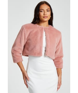 - Faux fur - Cropped fit - Long sleeves - Cape style - Hook and eye closure