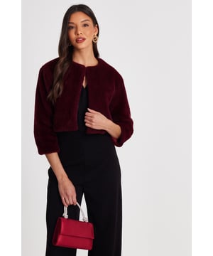 - Faux fur finish - Cropped sleeves - Hook and eye closure - Cropped fit - Cape style - Always check the wash care label - Cool hand wash with mild detergent
