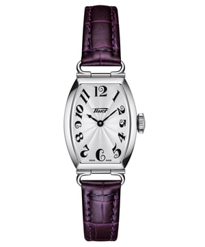 This Tissot Heritage Porto Small Lady Analogue Watch for Women is the perfect timepiece to wear or to gift. It's Silver  Tonneau case combined with the comfortable Purple Leather watch band will ensure you enjoy this stunning timepiece without any compromise. Operated by a high quality Quartz movement and water resistant to 3 bars, your watch will keep ticking. The Tissot Heritage Collection turns back the hands of time and revisits models that testify to the rich history of Tissot. This Analogue watch has a Swiss Made Movement High quality Purple Leather strap with a secure Buckle, measuring 19 cm in length and 12 mm in width Case measurement: 22 X 28 mm,case thickness: 8 mm, case colour: Silver and dial colour: Silver