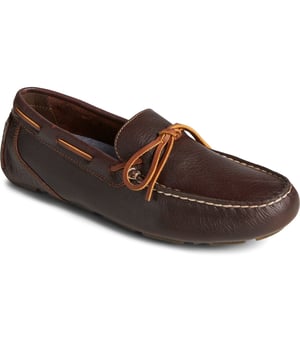 Show off your sense of style with our Davenport 1-Eye driving shoe. Crafted from pure premium leather, with luxurious rawhide laces and meticulous moccasin stitching, these tasteful loafers sit atop a slim podded rubber outsole.