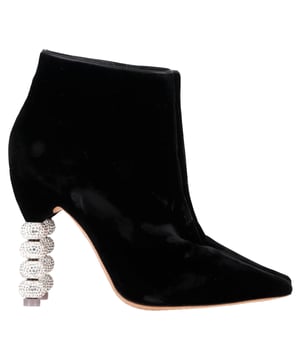 VINTAGE, RRP AS NEW
Command attention from the ground up with the Sophia Webster Coco Crystal Embellished Boots in Black Suede. These sculptural stiletto ankle boots blend classic elegance with signature flair, featuring a sleek suede silhouette and the brand’s iconic crystal-encrusted heel — a dazzling detail that turns every step into a statement. Sophisticated yet playful, they’re the perfect finishing touch for evening looks or elevating your everyday uniform. Glamour, with an edge of artistry.


Sophia Webster Coco Crystal Embellished Boots in Black Suede
Condition: Excellent
Signs of wear: No visible sign of wear. No Mark at insole.,  Very light mark at soles.
Packaging: None
Color: Black 
Material: Suede
Size: EU | 39.5
Measurements: Heel height: 110; Insole length: 290
SKU: NAPPUGBSH474414W