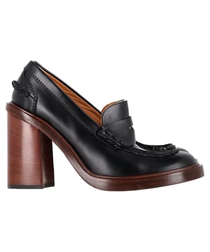 VINTAGE, RRP AS NEW
Elevate your work-to-weekend style with Tod's Loafer Pumps—a modern hybrid of timeless loafer and sophisticated pump. Crafted in sleek black leather, these shoes feature a rounded toe and a stacked block heel, delivering comfort without compromising on style. The slip-on design and leather sole reinforce Tod’s commitment to effortless luxury and craftsmanship.


Tod's Loafer Pumps in Black Leather
Condition: very good
Signs of wear: No visible sign of wear. No Mark at insole.,  Very light mark at soles.
Packaging: Dust bag
Color: black
Material: Leather | leather
Size: EU | 36.5
Measurements: Heel height: 90; Insole length: 280
SKU: NAPPUGBSH475872W