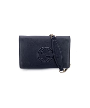 VINTAGE, RRP AS NEW
This beautiful item will come with a Certificate of ity provided by Entrupy. The certificate will be provided at no further cost  Gucci Soho Interlocking GG Wallet on Chain - Understated Luxury, Always in Style  Some pieces whisper luxury, and the Gucci Soho Interlocking GG Wallet on Chain does just that-effortlessly. Crafted in sleek black leather with the iconic silver GG logo elegantly resting on the flap, this vintage gem embodies Gucci's signature blend of modern practicality and timeless style.  Compact yet surprisingly spacious, it opens to reveal a black fabric-lined interior complete with a zip pocket, open pocket, six card slots, and a main compartment-plus a discreet extra pocket tucked under the flap for essentials on the go. The removable chain strap allows it to shift seamlessly from a shoulder bag to a chic clutch.  Engraved with 'Gucci - Made in Italy' and its original serial number, this piece is more than an accessory-it's a testament to Italian craftsmanship and enduring design. A must-have for lovers of vintage sophistication with a functional twist. Condition Rating: B - VERY GOOD CONDITIONCondition Details: Gently used. Minimal scratches on leather due to normal use. Some normal wear of use inside. Please check the photos carefully and ask if you need to know more details or if you have any doubts.Measurements (cm):Depth: 3.8Height: 12.7Length: 20.3Other Details: Dustbag? NoKeys? NoBox? No Measurments:  width: 38 mm length: 203 mm height: 127 mm