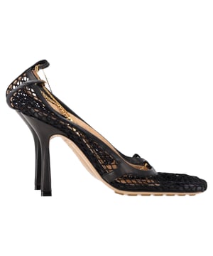 VINTAGE, RRP AS NEW
The Bottega Veneta Stretch Pumps in Black Mesh and Leather seamlessly blend high-fashion design with exceptional comfort. Featuring a sleek, form-fitting silhouette, these pumps contour perfectly to the foot, offering both elegance and ease with every step. Crafted from a sophisticated combination of black mesh and leather, they add a modern edge to any outfit while exuding the brand's signature luxury craftsmanship.

Bottega Veneta Stretch Pumps in Black Mesh and Leather

Condition: Excellent
Signs of wear: Include Box., No visible sign of wear. No Mark at insole.,  Very light mark at soles.
Packaging: Box, Dust bag
Color: Black
Material: Polyester
Size: IT | 36.5
Measurements: Heel height: 85; Insole length: 270
SKU: NAPPUGBSH475627W
