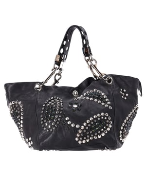 VINTAGE, RRP AS NEW
The Jimmy Choo Lola Hobo Bag is where luxury meets edge. Crafted from ultra-soft lambskin leather, this slouchy bag is adorned with bold studs and intricate mosaic pattern cutouts, adding a glamorous twist to an iconic shape. With its relaxed silhouette and attention-grabbing details, it’s a perfect companion for the fashion-forward woman who wants to turn heads wherever she goes.



Jimmy Choo Studded Lola Hobo Bag in Black Lambskin Leather 
Condition: Very good
Signs of wear: No retail tag, Minor sign of wear or markings., 
Packaging: None
Color: black
Material: Leather | leather
Size: One Size | One Size
Measurements: Width: 280; Height: 470; Length: 300; Handle drop: 0; Strap length: 560
SKU: NAPPUDEBA471166W
