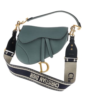 VINTAGE, RRP AS NEW
Maria Grazia Chiuri brings a fresh perspective to the legendary Dior Saddle Bag with this stunning update, crafted in luxurious blue calfskin. The unmistakable Saddle flap features a D stirrup strap with a magnetic pull closure, while antique gold-finish CD signatures on either side of the top handle add a refined touch. With a logo detailed, adjustable, and removable shoulder strap, this versatile bag can be carried by hand, worn over the shoulder, or styled crossbody. Inside, you’ll find a spacious interior pocket and a convenient back pocket, offering both elegance and practicality.


Dior Saddle Bag in Blue Leather
Condition: Excellent
Signs of wear: No retail tag, No visible sign of wear., 
Packaging: None
Color: blue
Material: Leather | leather
Size: One Size | One Size
Measurements: Width: 60; Height: 190; Length: 240; Handle drop: 200; Strap length: 600
SKU: NAPPUGBBA468291W