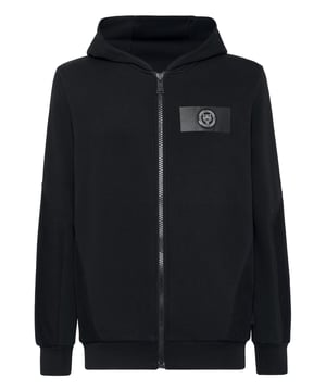 Maximiza los resultados de tu entrenamiento con esta chaqueta de deporte diseñada para superar tus límites.   Vellón de algodón elástico   Detalles de malla   Parche con logotipo en la cinta termosellada del pecho izquierdo   Capucha forrada   Impresión de la marca en la espalda   Cierre de cremallera   Dos bolsillos con aberturas   Dobladillo de punto elástico