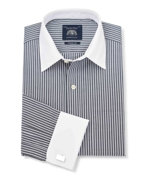 Black and white striped formal shirt with contrast white collar and cuffs. Crafted from the smoothest cotton and cut to our spacious classic fit. Contrast white curl resistant Windsor collar, with an integral and removable collar stay. 100% BCI cotton poplin; smooth to the touch. Generously proportioned classic fit. Curl resistant Windsor contrast white collar and double cuffs. Split yoke, long tails, chest pocket. Machine washable at 40°C. Shirt is presented in fully recyclable packaging.