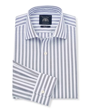 This navy and white striped shirt will bring a fresh feel to your formal ensembles. Cut to a slim fit shape with a curl-resistant collar, it can be worn with or without a tie. 100% BCI smooth cotton poplin; silk protein easy-care finish. A flattering, gently tapered fit for all builds. Curl resistant cutaway collar, with an integral and removable collar stay. Pucker-free french taped armhole seams. Split yoke, two back darts. Machine washable at 40°C. Presented in fully recyclable packaging.
