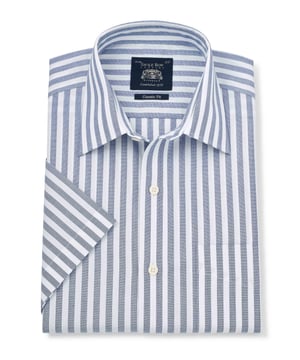 This men's short sleeve shirt is a fine addition to your summer wardrobe. Crafted from cotton with a curl-resistant collar, it's an excellent semi-formal option that'll keep you cool as well as stylish. 100% BCI smooth cotton poplin; silk protein easy-care finish. Generously proportioned classic fit. Curl resistant windsor collar, with an integral and removable collar stay. Pucker-free french taped armhole seams. Split yoke, long tails, chest pocket.  Machine washable at 40°C. Presented in fully recyclable packaging.