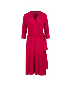 Sumérgete en una elegancia natural con este vestido cruzado con cuello en V y manga 3/4, confeccionado con un tejido de punto de viscosa y elastano lujosamente suave. Diseñado para favorecer, este vestido presenta un corpiño ajustado, cintura fruncida y un cinturón anudado, creando una silueta bellamente definida. La falda fluida de corte A cae con gracia, lo que la convierte en una pieza atemporal para cualquier ocasión. Perfecto tanto para ambientes informales como formales, este vestido versátil combina perfectamente del día a la noche. Combínalo con tacones para una apariencia elevada u opta por zapatos planos para un conjunto elegante y sin esfuerzo.