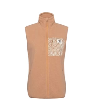 De Rothe Vest van Kari Traa voor dames biedt uitstekende warmteprestaties en functionaliteit. Voorzien van een opstaande kraag en een doorlopende rits aan de voorkant, is hij ademend en snel drogend. De vest heeft een borstzak en ritszakken aan de voorkant voor extra opbergruimte. Draag hem als isolerende laag onder je jas tijdens je avonturen. Deze vest is de perfecte keuze voor actieve vrouwen die waarde hechten aan comfort en functionaliteit.