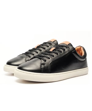 Catesby England was founded in 1970 with a vision and dedication focused on quality, craftsmanship, and a fine attention to detail. From its modest beginnings in a countryside workshop, Catesby England grew into a name synonymous with classic English footwear, blending heritage with modern craftsmanship, manufactured from the finest leathers to ensure durability, comfort, and effortless style.
 Crafted from premium leather, this must-have trainer blends sleek, casual design with all-day comfortperfect for wherever the day takes you. Whether youre dressing up for the office or keeping it cool on the weekend, the Catesby Hugo has you covered.
 With its subtly padded ankle collar, ultra-soft lining, and cushioned foam footbed, every step feels like a treat. Versatile, stylish, and endlessly wearablethis is the trainer your wardrobes been waiting for.
 - Premium leather upper
 - Lace fastening
 - Subtle Padded Collar for Added Comfort
 - Super Soft Cushion Comfort Insole
 - Durable outsole
 - Catesby branding