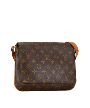 Brand: Louis Vuitton
Model: Musette Tango
Color: Brown
Material: Canvas
Inclusions: Dust bag
Dimensions: 20cm x 26cm x 4cm
Serial number: SD0050
Country of origin: United States of America
Condition: AB - good condition.
The Louis Vuitton Musette Tango shoulder bag is a sophisticated and functional accessory crafted from durable PVC leather in a timeless brown shade. Its sleek design and quality craftsmanship make it a versatile addition to any wardrobe.
Overall the bag shows slight scratches minimal dirt and minor traces of use. There is slight sun damage on the sides and bottom along with slight peeling and sun damage on the strap. The hardware also exhibits slight peeling. Despite these minor imperfections the bag remains in generally good condition. 
We recommend that you look at all the photos before making your purchase to ensure that you are satisfied with the condition of the item.Brand: Louis VuittonType: shoulderMain Material: Canvas