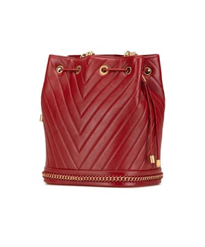 This bucket bag features a quilted lambskin body a chain link strap with leather shoulder guard an open top with drawstring closure and an interior slip pocket.Brand: ChanelCondition: Pre-lovedType: Bucket BagRating: B+Main Material: LeatherDimensions (LxWxD): 24.5x21x15.5Strap Drop: 50Dust Bag: YesComments: Exterior Bottom Creased. Exterior Bottom stained with Other. Embellishment Scratched. Exterior Front stained with Other. Exterior Handle Worn. Interior Lining stained with Other. Practical Attachment Scratched. Exterior Top Worn.