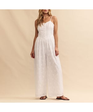 Womens Nobody's Child Tricia Broderie Anglaise Jumpsuit in white.So effortless.  Here’s another white jumpsuit to add to your collection. Featuring broderie anglaise embroidery all over  Tricia is framed by a corset-inspired dipped waist that flares out into a breezy wide leg cut. Style yours with summer sandals.- Adjustable spaghetti straps - Covered buttons- Shirred sides for comfort - Wide leg cut that skims the body - Lightly lined so the fabric falls beautifully- Size tip: we recommend your usual size- 85% Birla Lyocell™  15% Linen.  Machine washable.- Ref: P240880WHT