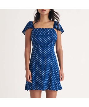 Womens Nobody's Child Elise Polka Dot Mini Dress in blueMade entirely from responsible viscose  this blue and white polka dot print is perfect for garden parties in the sunshine. Shirring at the back adds to the fit. Elevate yours with flat pumps.• Square neck• Short flutter sleeves • Fitted bodice that defines the waist • Shirred back for comfort • Back waist tie100% LENZING™ ECOVERO™ Viscose.  Machine washable.Ref: D242765BLU