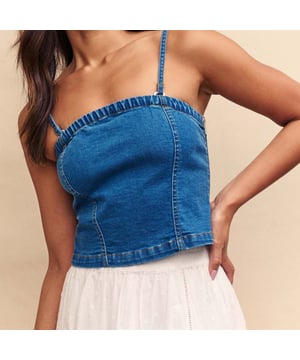Spring is here. This structured bandeau is perfect for sun-filled celebrations in blue denim. Made from organic cotton blended with a touch of stretch  it's sure to frame your figure in all the right places.  Elevate yours with gold jewellery. - Concealed zip fastening - Designed for a close cut.- Ref: D240726BLU