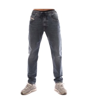 Heren Diesel 2030 D-Krooley Sweat Jeans in denim.- Sluiting met rits en trekkoord.- 5 pocket ontwerp.- Distressed details.- Slim fit.- 77% Katoen 19% Lyocell 3% Elastaan 1% Andere Vezels.- Ref: A11883068KB01