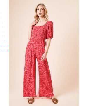 Charming ditsy print bodysuit with elegant shirred bodice for a flattering fit
        Feminine puff sleeves add a touch of romance to this versatile piece
        Wrap neckline creates a sophisticated silhouette
        Wide-leg design offers comfort and effortless movement
        Practical side pockets for everyday convenience
    
    This delightful Dorothy Perkins bodysuit combines comfort with style for the modern woman. The shirred bodice creates a beautifully fitted silhouette while the puff sleeves add a feminine touch that's right on trend. Perfect for casual gatherings, simply pair with flat sandals and a denim jacket for brunch with friends or family get-togethers. The wide-leg design ensures all-day comfort without compromising on style, making it an ideal choice for baby showers or weekend outings. For cooler days, layer with a light cardigan or cropped jacket. The wrap neckline offers a flattering look that's not too revealing, while the all-over ditsy print adds character to this easy-to-wear piece. Machine washable for fuss-free care, this bodysuit will quickly become a wardrobe favourite.