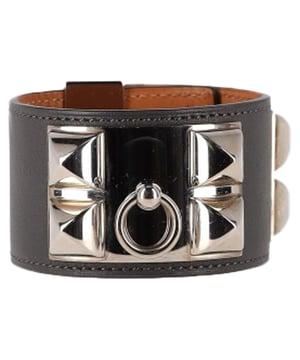 VINTAGE, RRP AS NEW
A staple in the world of luxury accessories, the Hermès Collier de Chien Bracelet fuses rich black Box leather with sleek palladium-plated hardware for a look that’s both timeless and daring. Originally inspired by a 1927 dog collar belt, this cult favorite has evolved into a collector’s must-have. The oversized studs and signature ring make a striking statement, while its impeccable craftsmanship ensures it's just as wearable day to night.


Hermès Palladium Plated Collier de Chien Bracelet in Black Box Leather 
Condition: Excellent
Signs of wear: 
Packaging: None
Color: black
Material: Leather | leather
Size: One Size | One Size
Measurements: Width: 40; Length: 250
SKU: NAPPUGBJE469780W