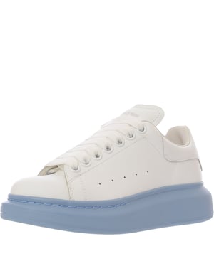 Alexander Mcqueen Oversized Sneakers
       â€¢ Brand: Alexander Mcqueen
       â€¢ Material: 100%Calf
       â€¢ Design: These sneakers embody the perfect mix of street style and luxury, crafted from high-quality 100% calf leather for a premium, smooth finish. The design features an oversized, chunky sole, which is a signature of the brand, offering both style and comfort. The clean, minimalist upper often boasts subtle branding like embossed logos, ensuring an understated elegance
       â€¢ Colour: 
       â€¢ Style: The Alexander McQueen Oversized Sneakers offer a blend of high-fashion appeal and modern comfort. The chunky sole gives them a distinct, sporty edge while the premium calf leather ensures long-lasting wear. Whether you're pairing them with casual denim, chic skirts, or tailored trousers, these sneakers elevate any look