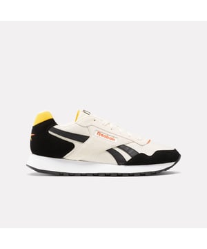 Reebok Glide Trainers in white black.- Suede upper.- Lace up fastening.- Reebok branding.- EVA Midsole.- Rubber sole.- Ref: 100207950