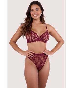 Elevate your lingerie game with this sweetly seductive 'Eva Dark Cherry Graphic Embroidery High Waist Thong'. Cut to sit flatteringly high on the hip and crafted from sheer mesh overlaid with a delicate floral embroidery in a dark cherry hue, this is a grownup thong that screams opulence.Match with the Eva Bra and Suspender Belt for the full elegant ensemble.





Cotton gusset
Dark cherry mesh with floral embroidery

High waist, thong style