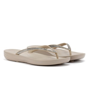 Waterproof ergonomic flip-flops with a durable rubber upper and anatomically shaped straps for a secure fit adorn with micro-crystals . Designed with a contoured footbed to support natural alignment and reduce toe gripping. Lightweight, flexible, and perfect for beach days, poolside lounging, or everyday summer wear.