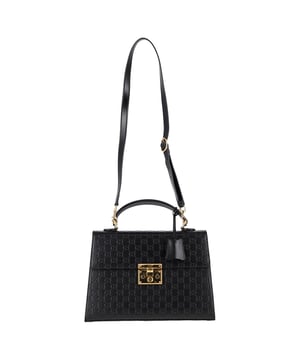 VINTAGE, RRP AS NEW
 The Gucci Small Padlock Guccissima Handbag in black leather is a timeless accessory, showcasing the signature Guccissima embossing and gold-toned padlock closure for a touch of vintage elegance. Compact yet structured, it’s crafted from luxurious leather and features a sliding chain strap for versatile shoulder or crossbody wear. Styling tip: Pair it with a tailored blazer and high-waisted jeans to effortlessly elevate your everyday look with classic Italian sophistication.

Gucci Small Padlock Guccissima Handbag in Black Leather

Condition: Excellent
Signs of wear: No retail tag, No visible sign of wear., 
Packaging: Dust bag
Color: Black
Material: Leather | leather
Size: One Size | One Size
Measurements: Width: 90; Height: 230; Length: 330; Handle drop: 80; Strap length: 900
SKU: NAPPUGBBA475707W