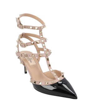 Upper: 100% leather
 Color: Black and Pink
 Rubber sole
 Heel height: 65 mm
 Other details: rivets on the strap
 Made in Italy