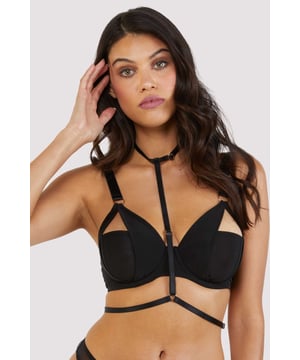 Our classic Juliet is back...The ultimate vavavoom bra, the Juliet Harness Bra just begs not to be hidden away! Compiled of strong black mesh, cut outs across the middle of the cups reveal another vertical panel underneath, covering the nipple. The thick black straps are echoed with the matching harness that comes with each bra. Adjustable sliders across the length and the waist allow the harness to be tailored to you. Match with the Juliet Black Roll On Girdle and choice of Thong or High Waist Brief for the full look.




Black Mesh Harness Bra
Cut out details
Adjustable straps
Underwired




Main 1: 76% Polyamide 24% Elastane. Lining 100% Polyamide. Excluding Trims 