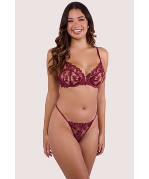 Elevate your lingerie game with this sweetly seductive 'Eva Dark Cherry Graphic Embroidery Thong'. Crafted from sheer mesh overlaid with a delicate floral embroidery in a dark cherry hue, this is a grownup thong that screams opulence. Satin elastic straps sit flatteringly high on the hip and connect to the gstrong style back.Match with the Eva Bra and Suspender Belt for the full elegant ensemble.



Cotton gusset
Dark cherry mesh with floral embroidery
Satin elastic bands at hips

Thong style