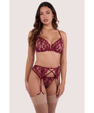 Elevate your lingerie game with this sweetly seductive 'Eva Dark Cherry Graphic Embroidery Suspender'. Constructed from satin elastic straps that cross at the centre and are overlaid with sheer mesh adorned with delicate floral embroidery in a dark cherry hue this is a grownup suspender belt that screams opulence. Four adjustable suspender straps and a hook and eye fastener to the back ensure the perfect fit. Match with your favourite pair of stockings along with the Eva Bra and Brief for the full elegant ensemble.





Dark cherry mesh with floral embroidery
Satin elastic waistband with crossover detail
Four adjustable suspender straps

Hook and eye fastener