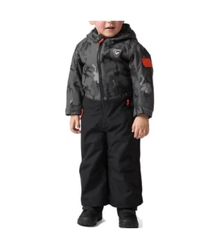 100% Polyester. The kids' Flocon Ski Suit offers head-to-toe insulation for skiers aged two to six. A waterproof, breathable membrane sheds cold, wet weather while wicking moisture away from the skin. The adjustable hood and cuffs offer room to grow and extend wear through multiple seasons