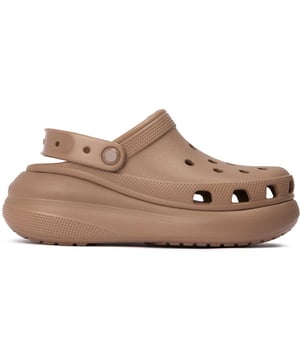 Step into summer fun and give yourself some extra height with the Crocs Classic Crush clogs. These iconic, lightweight slides cradle your feet in blissful comfort thanks to the soft upper and moulded Croslite foam footbed and the platform sole adds a flattering lift to your looks. Slip them on to run errands or enjoy a casual summer day. With signature ventilation ports, these sandals promise carefree fun wherever your days take you.