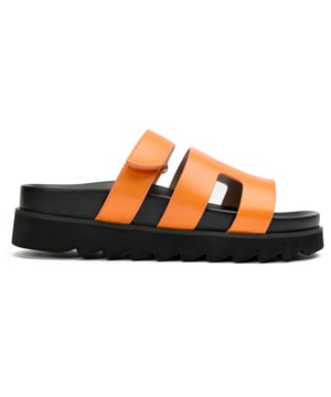 The Shea Slide from V.Gan is the ultimate summer companion.  These fashion-forward, super comfy V.Gans are crafted from high-quality PETA-approved vegan uppers and soles, have a slightly raised platform, offering sleek style and ethical chic. Made in a certified vegan factory using sustainably sourced materials and shipped in recycled packaging, this warm-weather staple will take you on holidays as well as urban alfresco outings and staycation adventures.