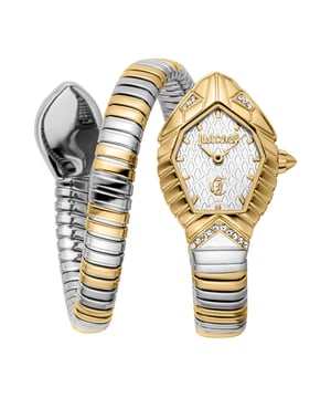 A perfect harmony of luxury and boldness comes to life in a wrap-around design that captures the magnetic elegance of a serpent. The double-wrap bracelet, with its refined interplay of gold and silver, coils around the wrist with a sinuous allure, highlighting the daring character of a statement piece. The hexagonal case, reminiscent of precious scales, frames a white dial adorned with an embossed animalier pattern, a signature of the brand’s wild yet sophisticated spirit. Sparkling crystals set along the case and bracelet catch the light with every movement, enhancing the hypnotic allure of this timepiece. Designed for those who appreciate striking accessories, it is an icon of style for those who dare to stand out.