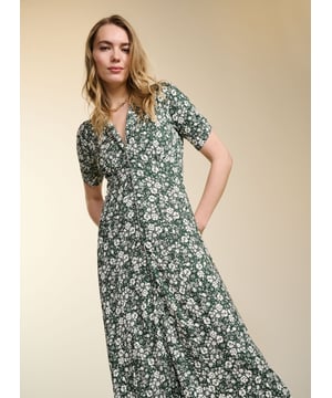 Description\nFits true to size, we suggest ordering your usual size.\nUnapologetically feminine, Sabine is our take on a French-style tea dress. This pretty midi in responsibly sourced jersey features gathering under the bust and is cut to skim the waist before flowing out. Its ditsy floral print and waist ties add to its vintage-inspired appeal. Reach for your basket bag and ballet pumps tout de suite! \n\nMade in Europe\nCrafted in LENZING™ ECOVERO™ jersey\nButtons through \nSewn-in back ties \n\n\nSustainable Attributes:\n\n\n Low Impact \n\n Low Water Use\n\n Ethically made \n \n Low Carbon \n \n\n\nDetails\n Model is 5'10 (177cm) and is wearing a UK 10\n95% LENZING™ ECOVERO™ Viscose, 5% Elastane\nDelicate Machine Wash - 30°\nProduct code: DR40578-FRD\nBack shoulder at neck to hem - 122cm (48)\nSleeve length - 24cm (9 1/2)