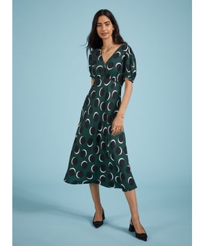 Description\nFits true to size, we suggest ordering your usual size.\nA customer favourite, the Kaydence dress returns for a new season in a fresh print. This chic midi is the one for smart events: it’s woven from Livaeco viscose, which gives a soft touch and lovely drape. Cut into an A-line shape, it features an under-the-bust seam and is slim through the waist. Wear it to every outing in your calendar with a blazer and your favourite shoes.\n\nMade in Europe\nWoven viscose twill with Livaeco\nFastens with an invisible centre-back zip\nMidi length\nV-shape neckline\n\n\nSustainable Attributes:\n Low Water Use Ethically made  Low Carbon \n\nDetails\n100% LivaecoDelicate Machine Wash - 30°Product code: DR40616-GSS Back shoulder at neck to hem - 124cm (48 3/4)Sleeve length - 29cm (11 1/2)