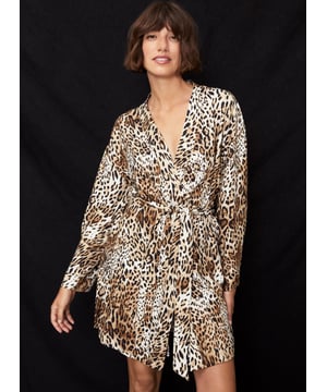 Description\nFits true to size, we suggest ordering your normal size.\nSlink around in style at home with the help of this elegant robe. Featuring the same timeless leopard print as our Mia Pyjamas set, this glamorous cover up is generously cut with wide sleeves and a co-ordinating belt. In a soft and feelgood (and responsibly sourced) fabric, pottering around the garden with a cup of coffee and lounging on the sofa never looked so chic. \nThe fabric is soft on the skin. The print is a never-dates statement. I can’t wait to wear Inu + Mia. - Baukjen\n\nCrafted in LENZING™ ECOVERO™ twill\nPockets\nFabric self-tie belt \nRelaxed fit \n\n\nSustainable Attributes:\n Made in Europe  Low Water Use Ethically made   Vegan  \n\nDetails\n Model is 5'10 (177cm) and is wearing a UK 10100% Lenzing™ Ecovero™ ViscoseDelicate Machine Wash - 30°Product code: LW40035-NPTBack shoulder at neck to hem - 90cm (35 3/8)Sleeve length - 46.5cm (18¼)