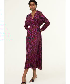 Description\nEkaterina brings together our favourite tones in an easy yet impactful dress which will ensure you feel ready for anything. An elegant silhouette is created with a loose top half and a curved seam below the bust, with the satin skimming the waist before flowing out. Slip it on and feel instantly party-ready.\n\nCrafted in viscose satin\nBatwing sleeves\nFit and flare shape\nSlash neckline detail\nConcealed rear zip and on each cuff\n\n\nSustainable Attributes:\n Made in Europe  Low Water Use  Ethically made   Vegan \n\nDetails\nModel is 5'10 (177cm) and is wearing a UK 10100% ViscoseDelicate Machine Wash - 30°Product code: DR40541-MGWBack shoulder at neck to hem - 127cm (50)Sleeve length - 30.5cm (12)
